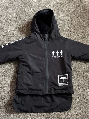 Kids Black Hooded Puffer Jacket with Weather-Ready Graphics